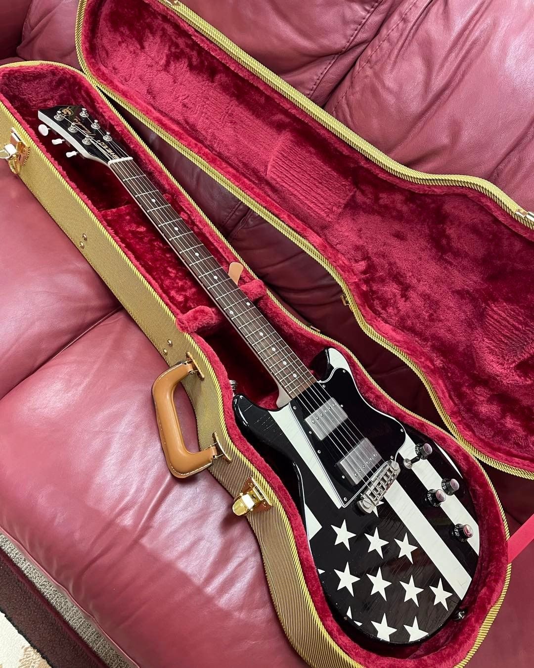 Classic black electric guitar with case