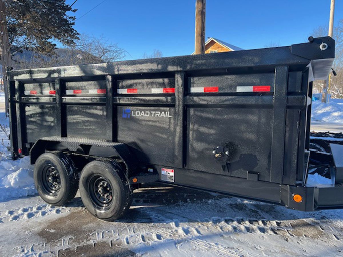 A black dump trailer