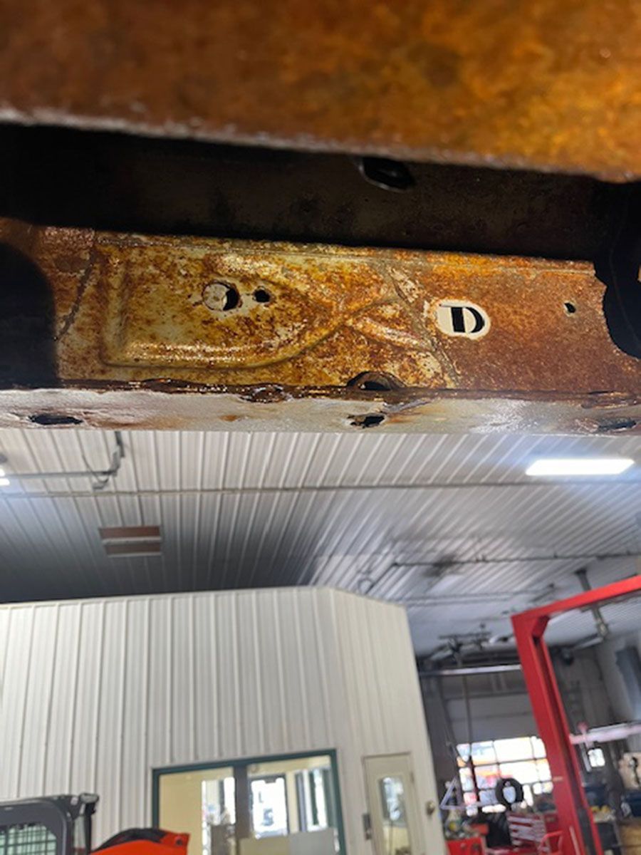A rusty car's underside