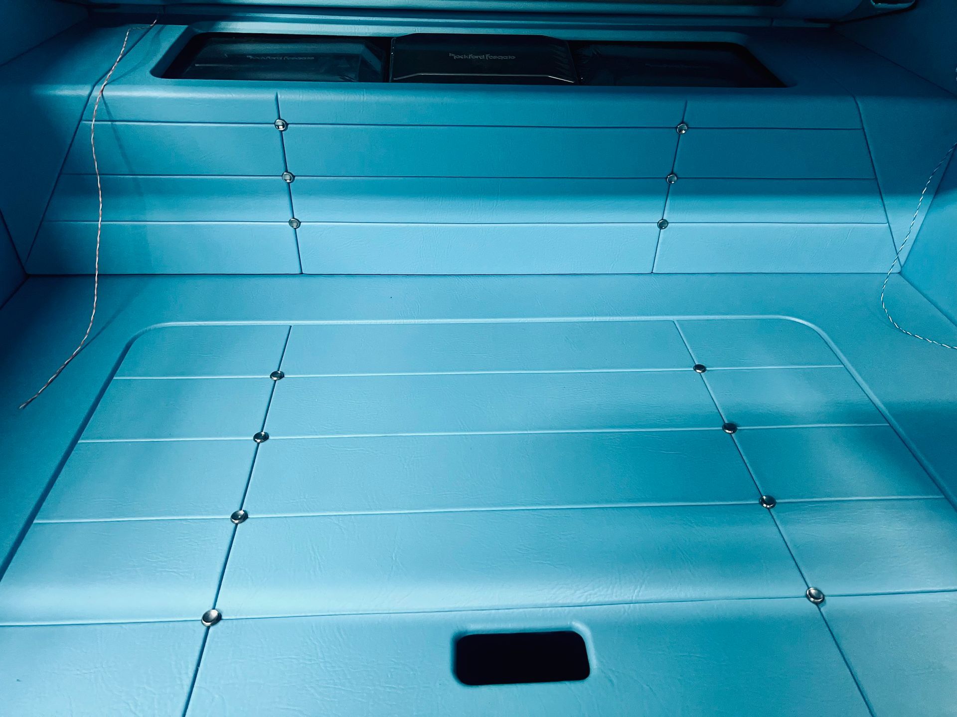 A blue box with a hole in the middle of it