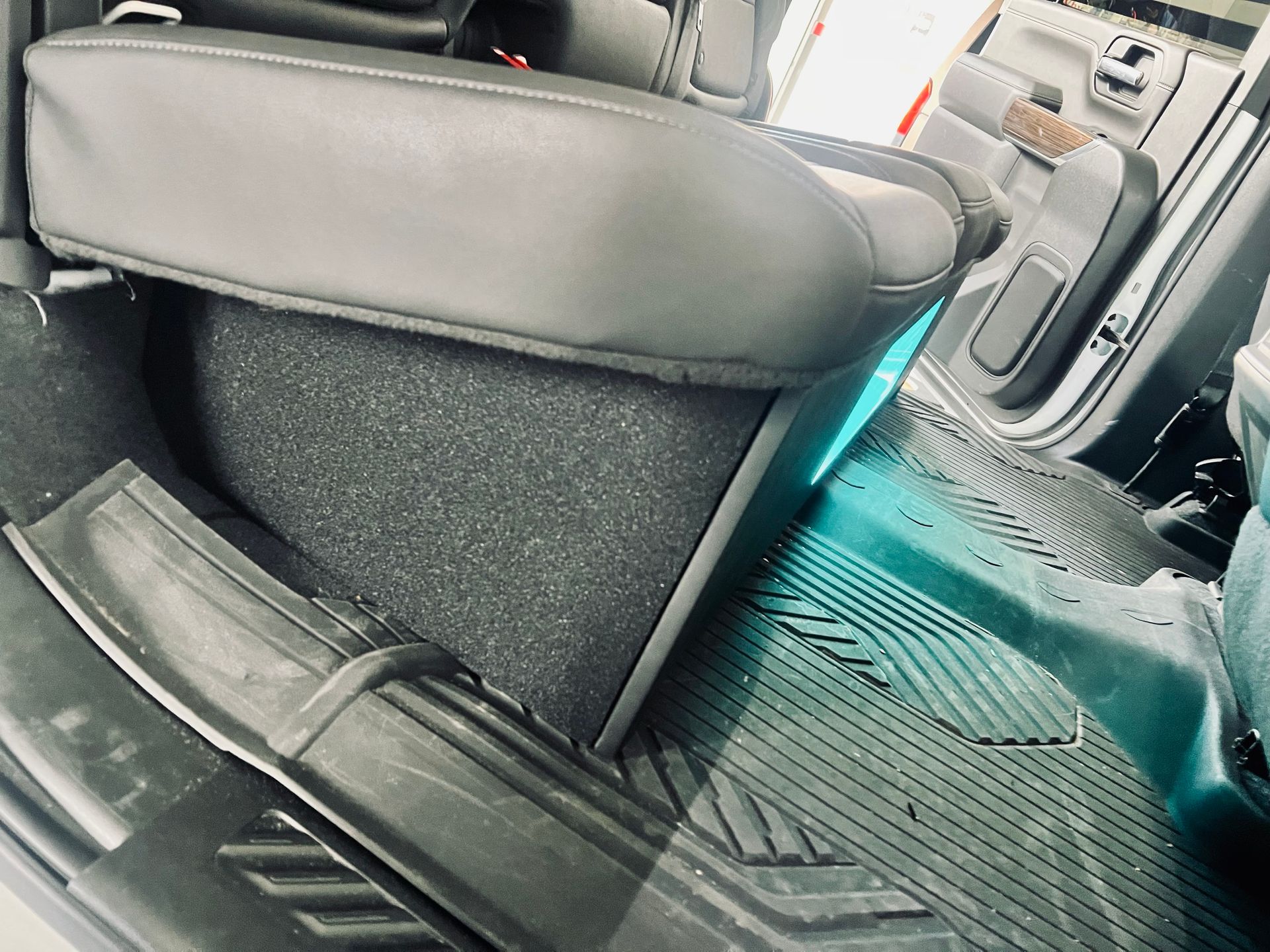 A car with a subwoofer in the back of it