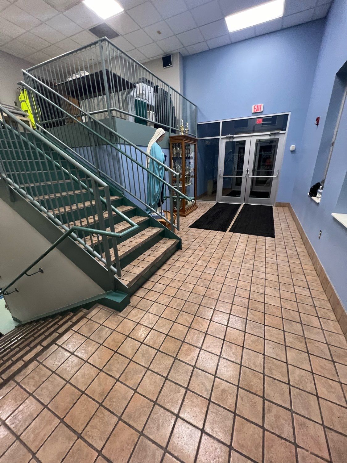 There are stairs leading up to the second floor of a building.