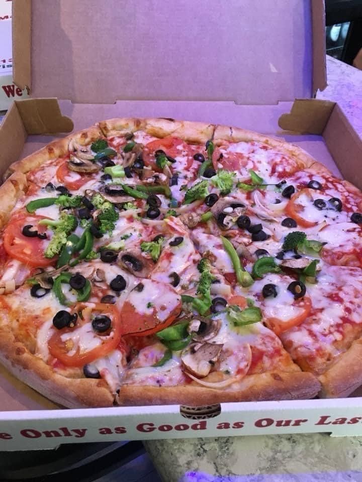 A pizza in a box that says only as good as our last