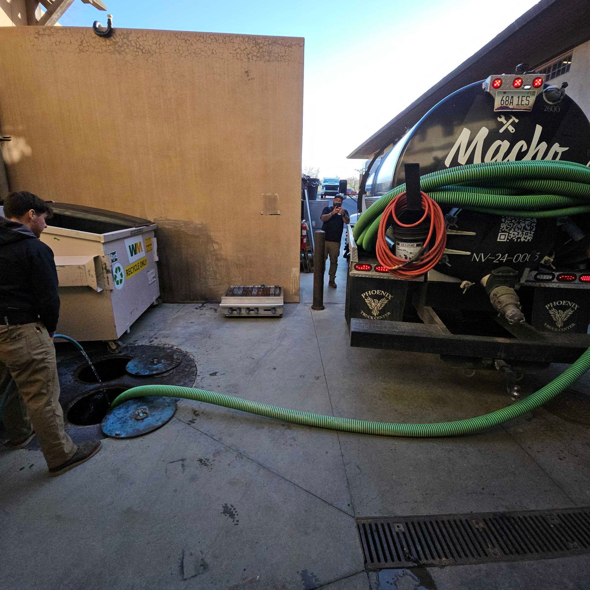 A black truck with the word macho on the back