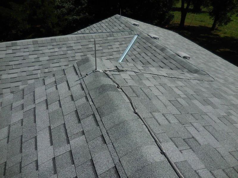 A close up of a roof with shingles on it