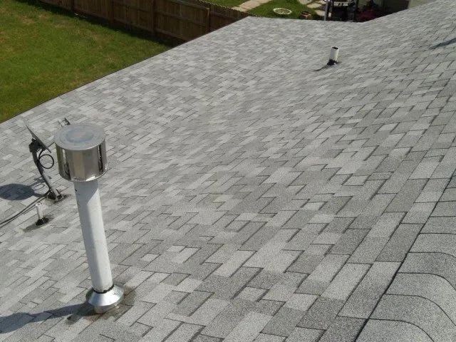 A roof with a chimney on top of it