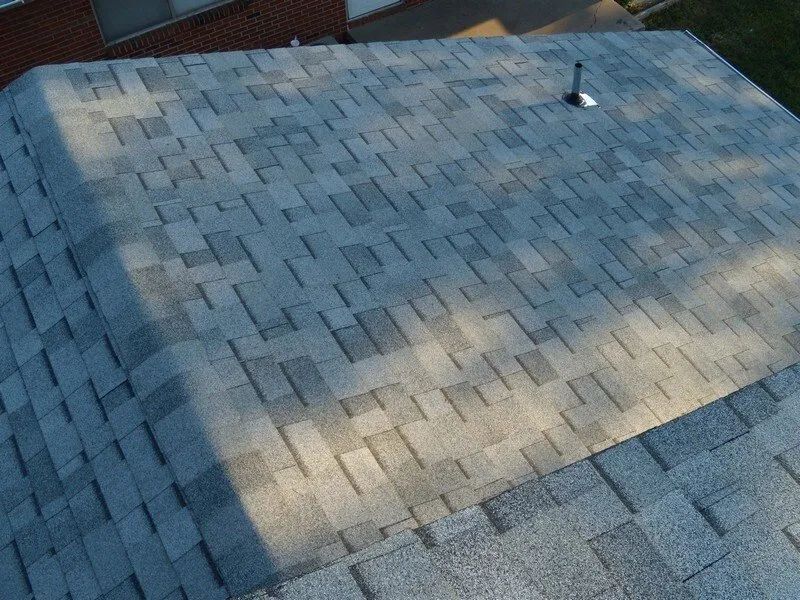 An aerial view of a roof with shingles on it