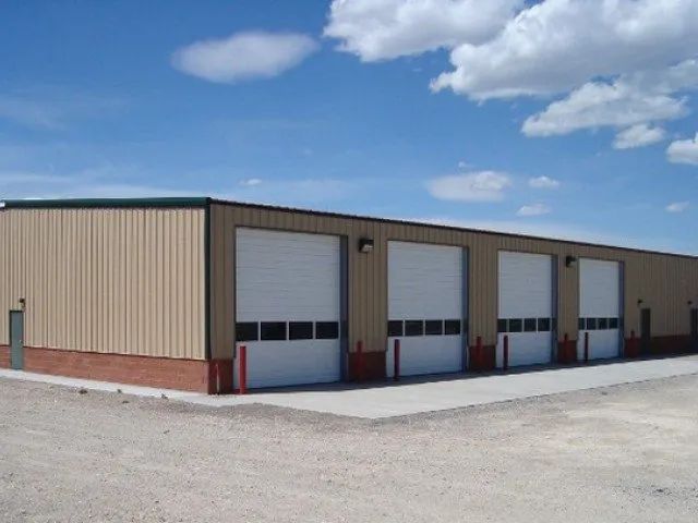 A building with a lot of garage doors on it
