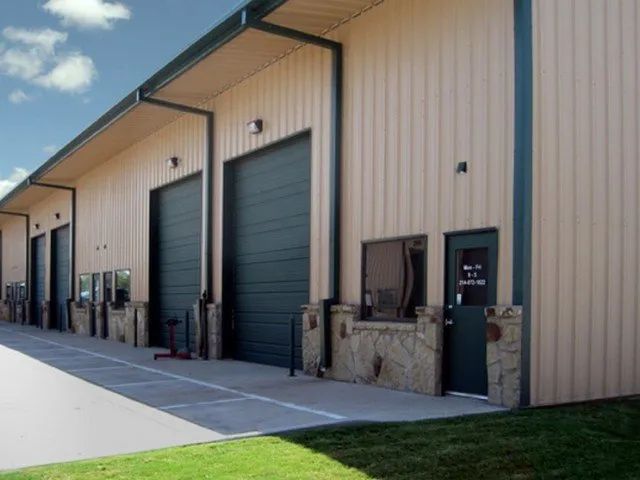 A building with a lot of garage doors 