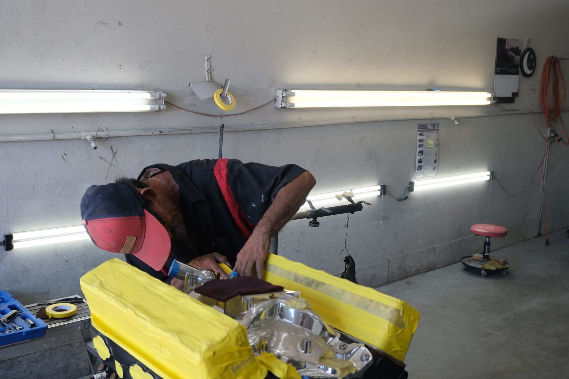 Worker repairing car collision damage