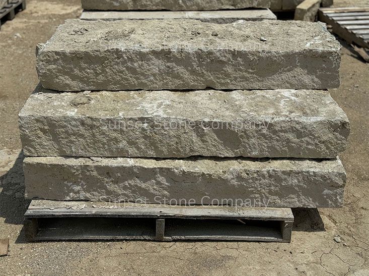 A stack of stone steps sitting on top of a wooden pallet.