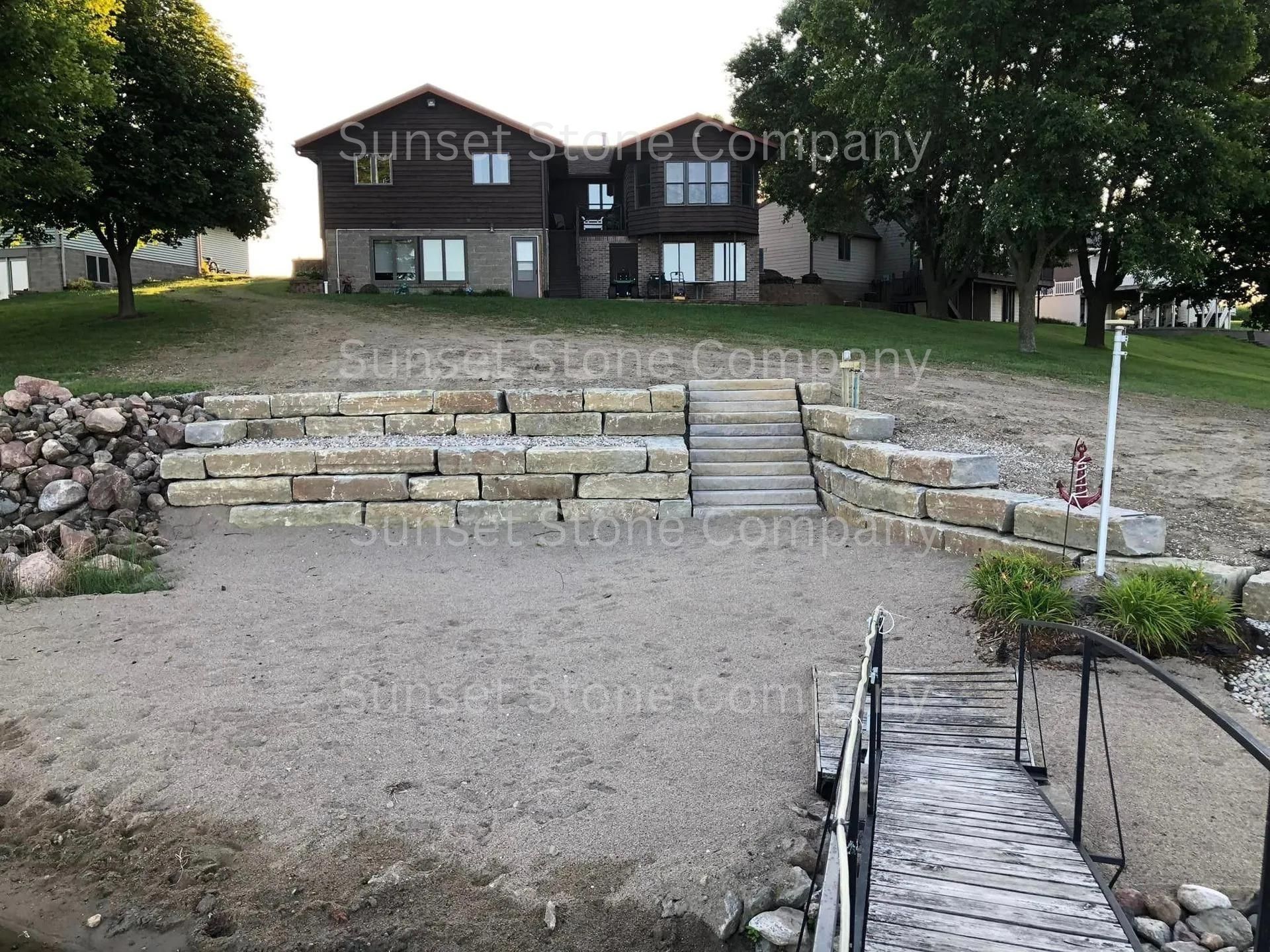 A large house with a bridge in front of it