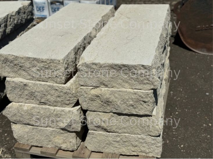 A pile of concrete blocks on a wooden pallet