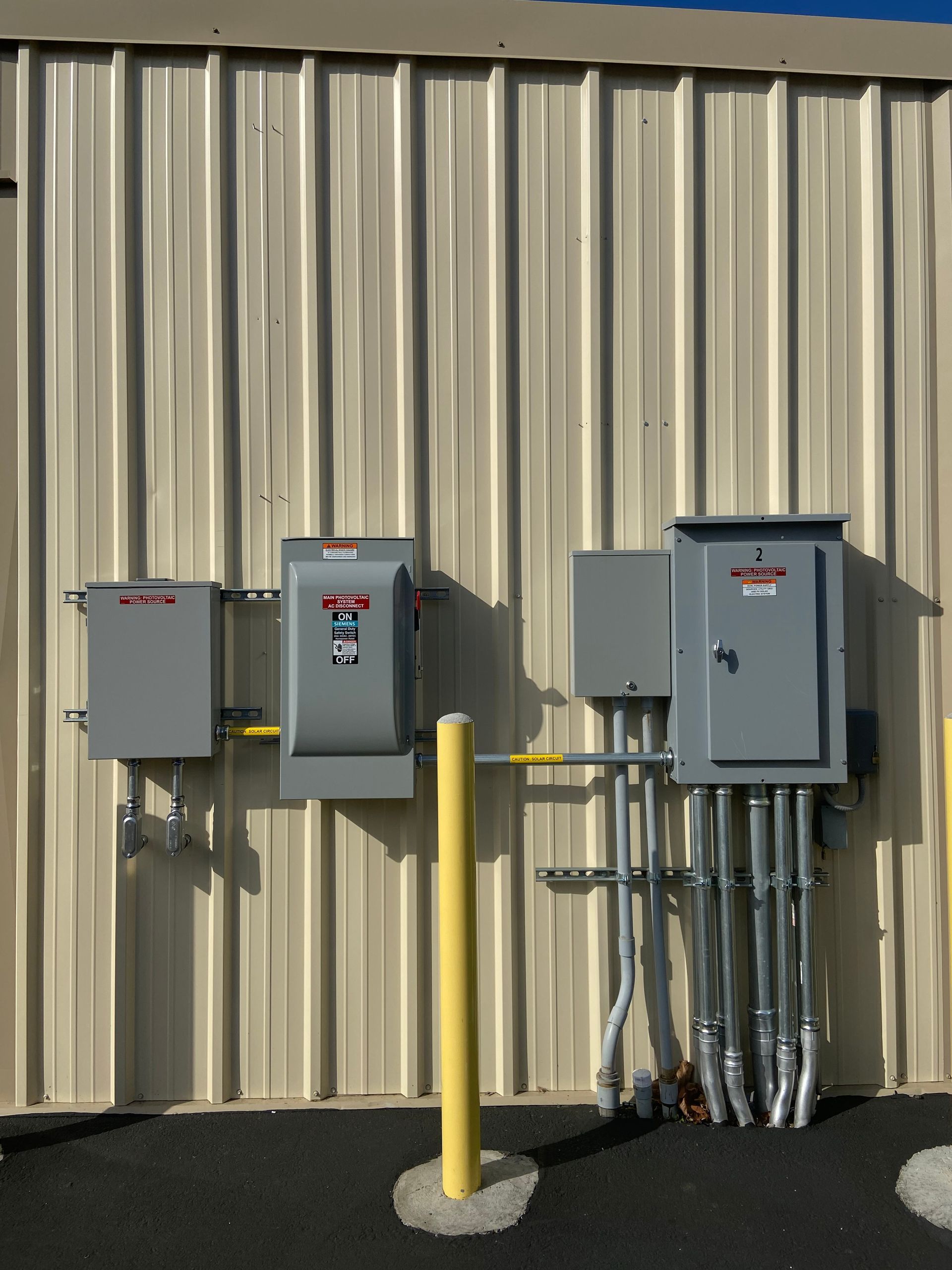 A building with a lot of electrical boxes on it