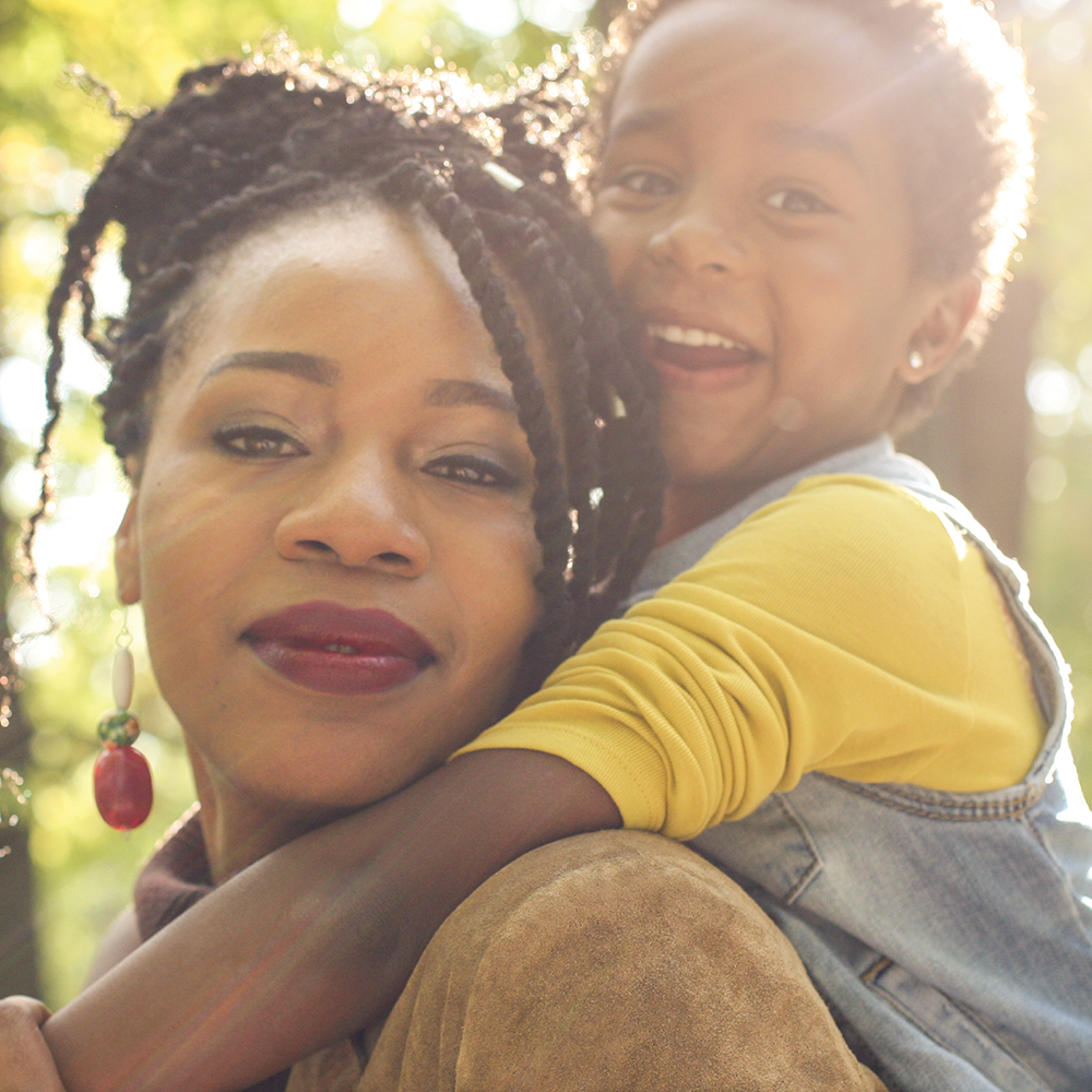 mother and son smiling