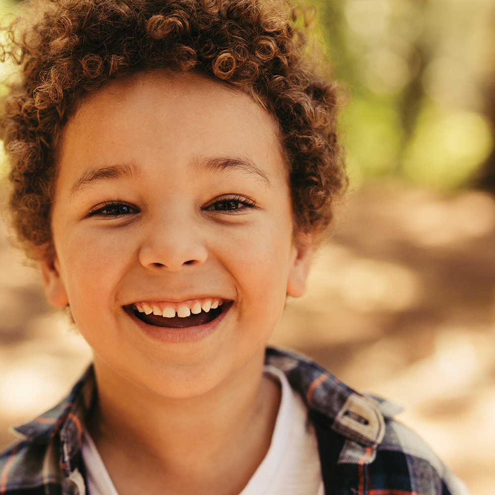 young boy smiling