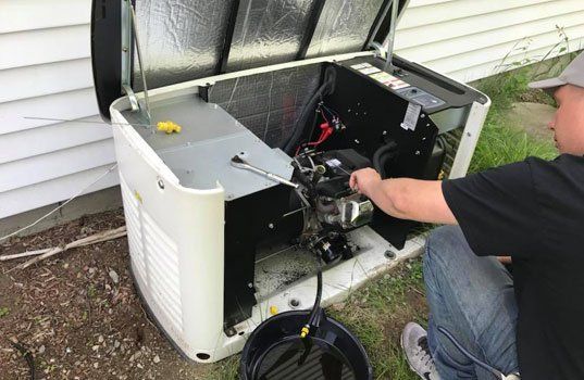Man repairing the generator