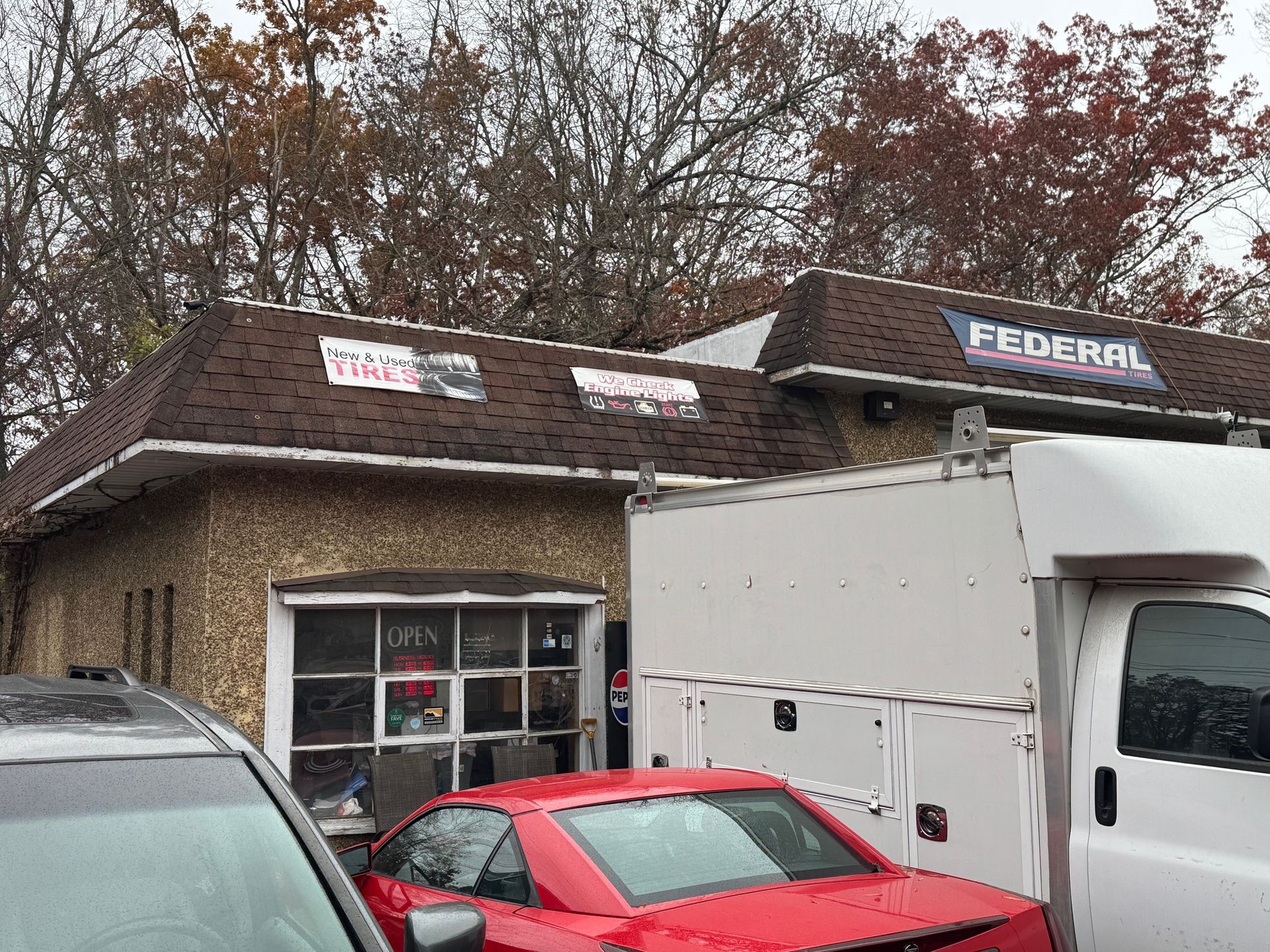 Small building with brown roof; 