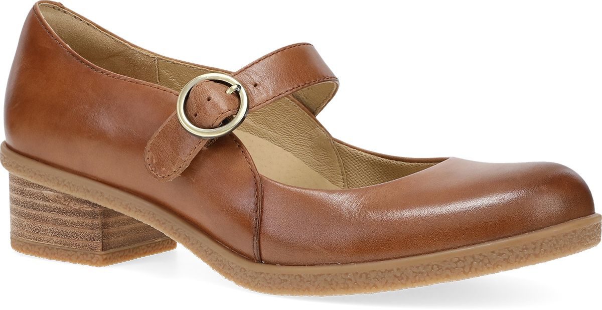 A pair of brown leather shoes with a buckle on the side.