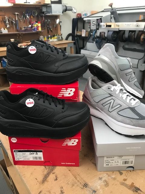 black and gray new balance custom shoes