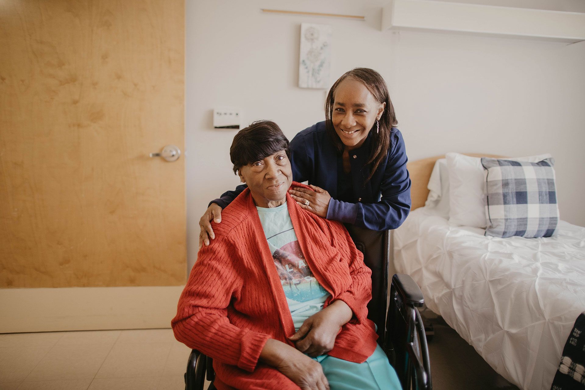 nurse taking care of an aged woman