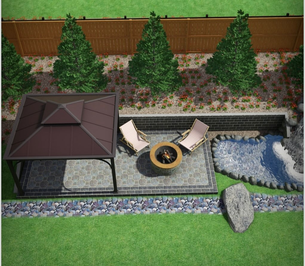 Landscaped backyard with a pond, waterfall, and gazebo. Rocks and gravel surround the water feature.