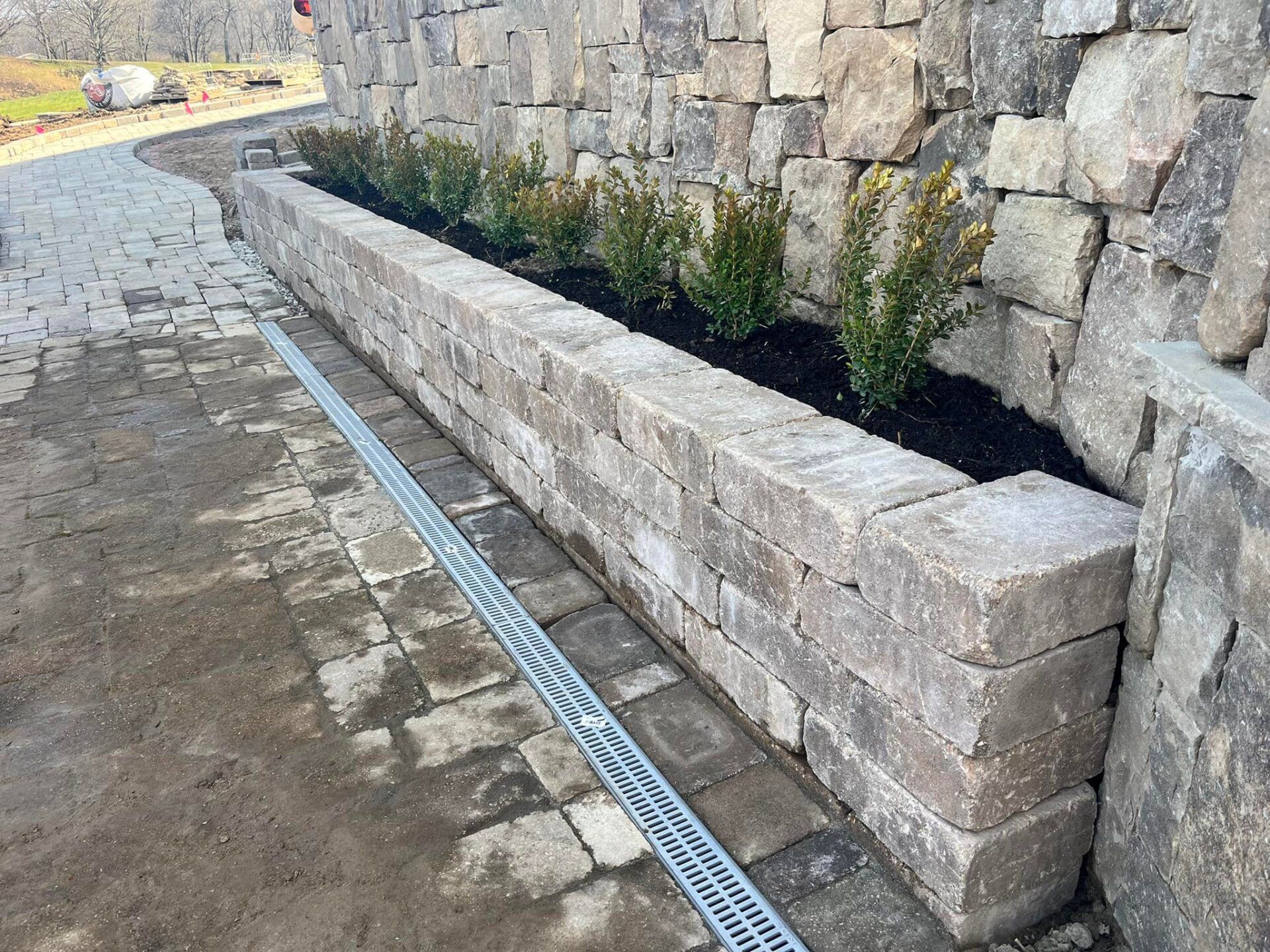 Retaining wall and drainage