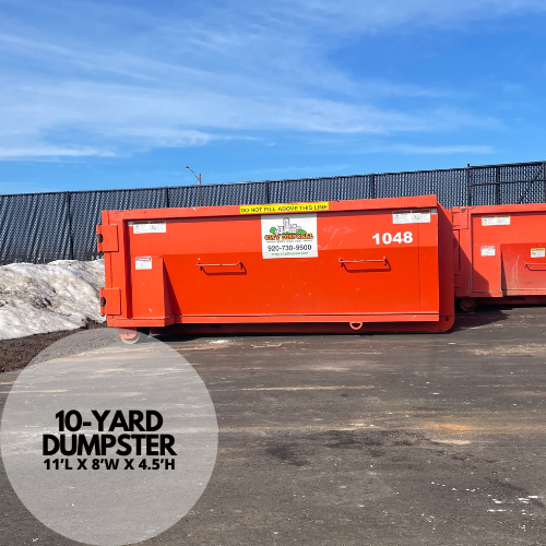 A large orange dumpster with the number 1035 on it