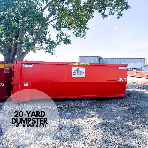 A large orange dumpster is parked in front of a house.