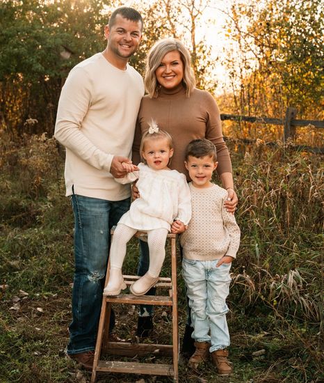 Tim and Katie with their children.