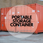 A portable storage container is sitting in front of a building.