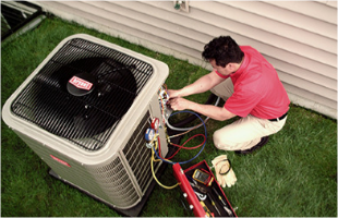Man installing bryant air conditioner