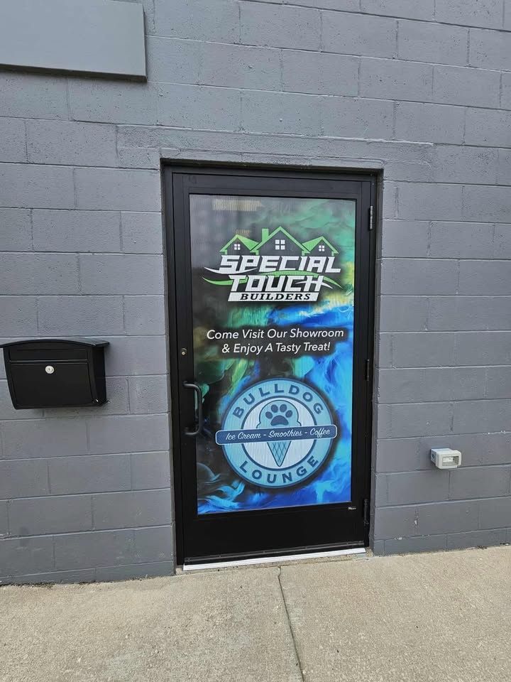 Black door with two business logos.