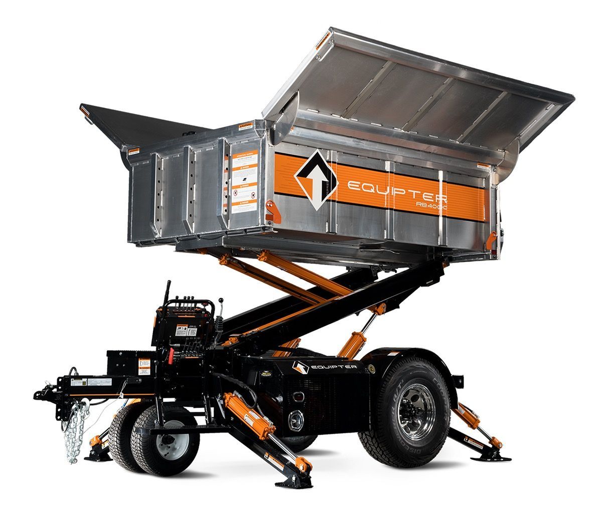 Orange and black mobile dumpster, raised in the air, with hydraulic lift system and tow hitch.
