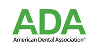 ADA logo with green letters and “American Dental Association” text on a white background