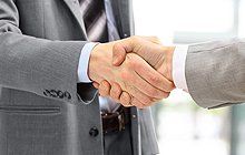 Attorney and client handshake