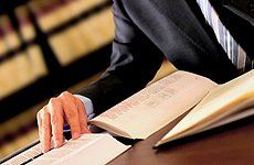 Attorney reading law books