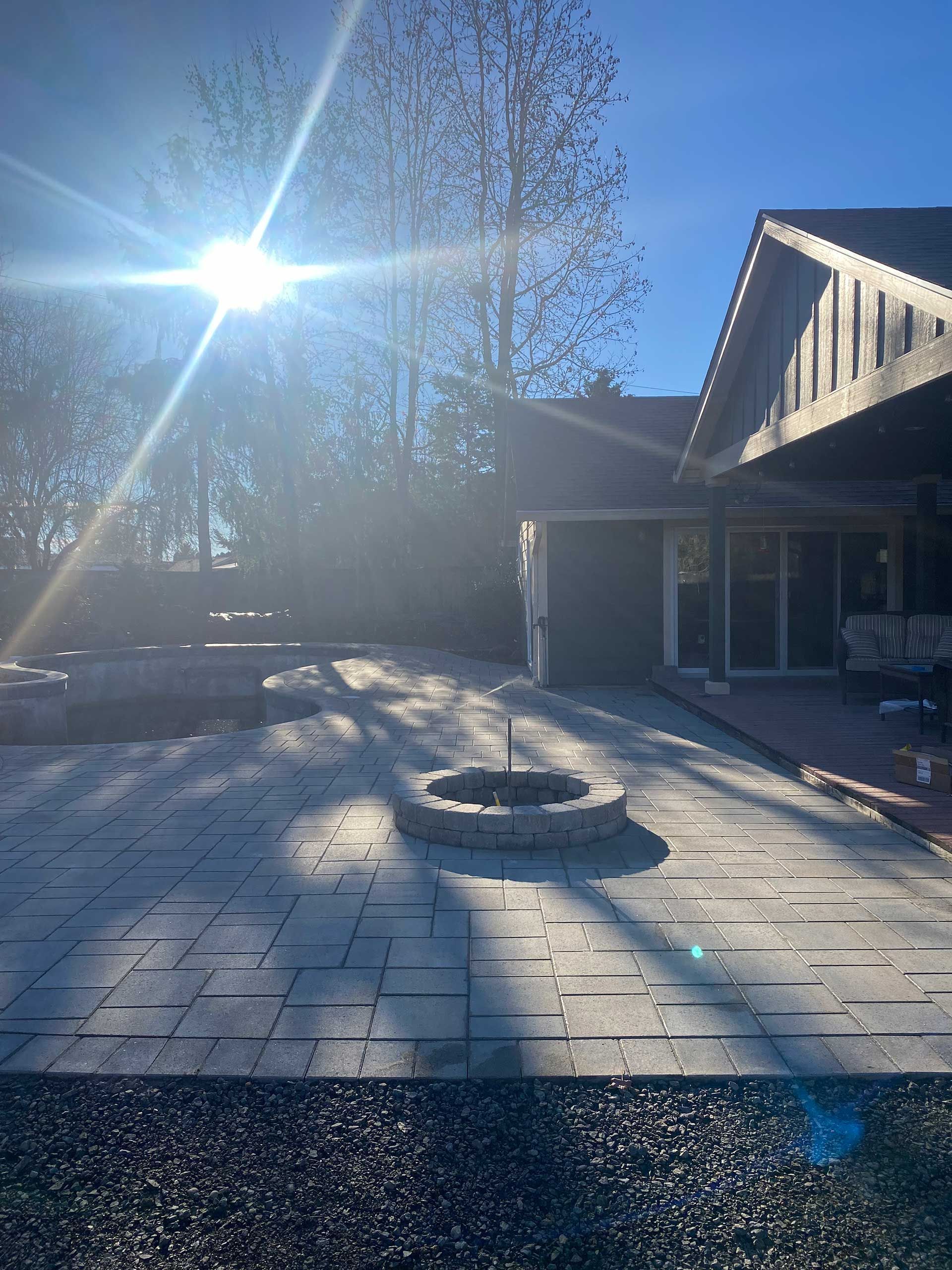 the sun is shining brightly on a patio