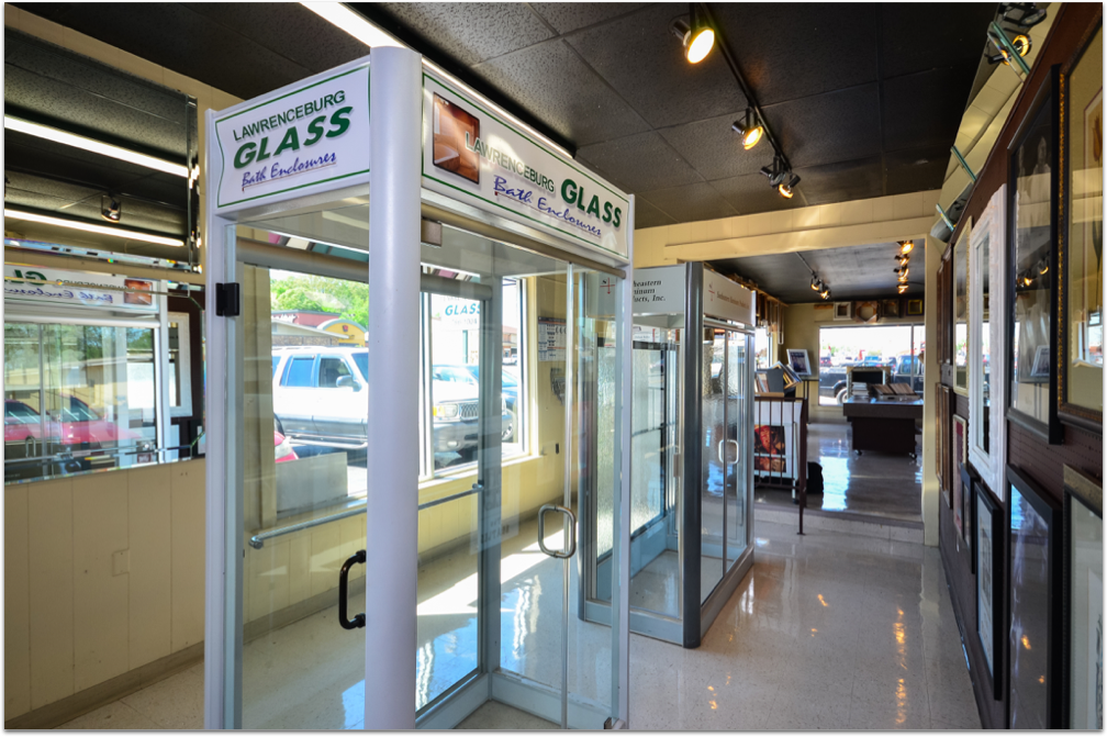 A store with a sign that says glass on it