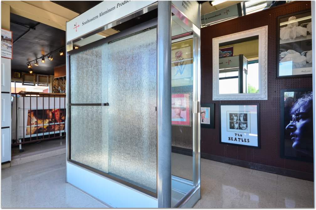 A room with a picture of the beatles on the wall