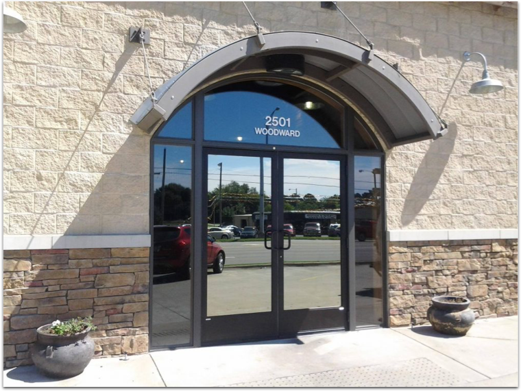 A store front with the number 2601 on the door