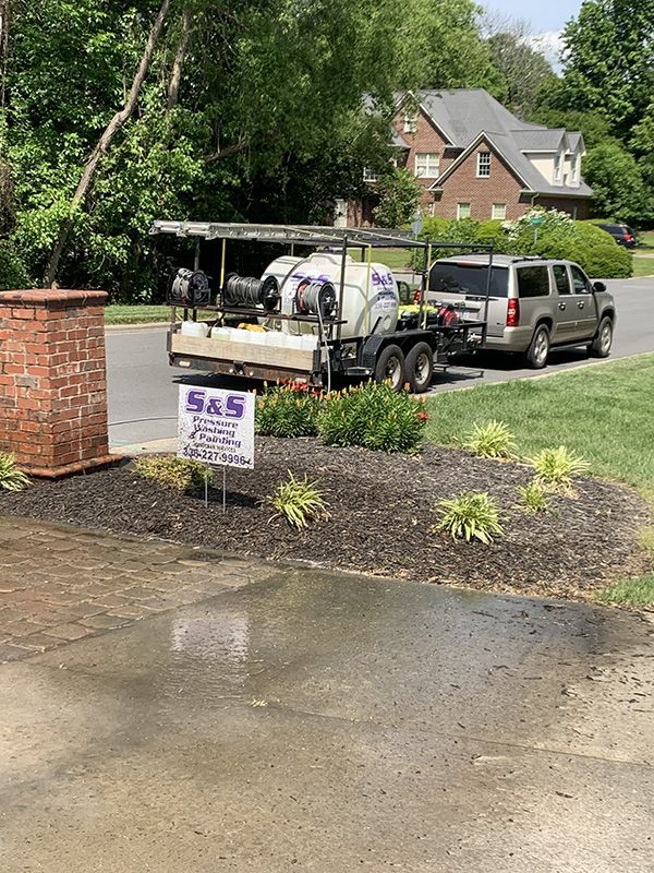Pressure washing driveway