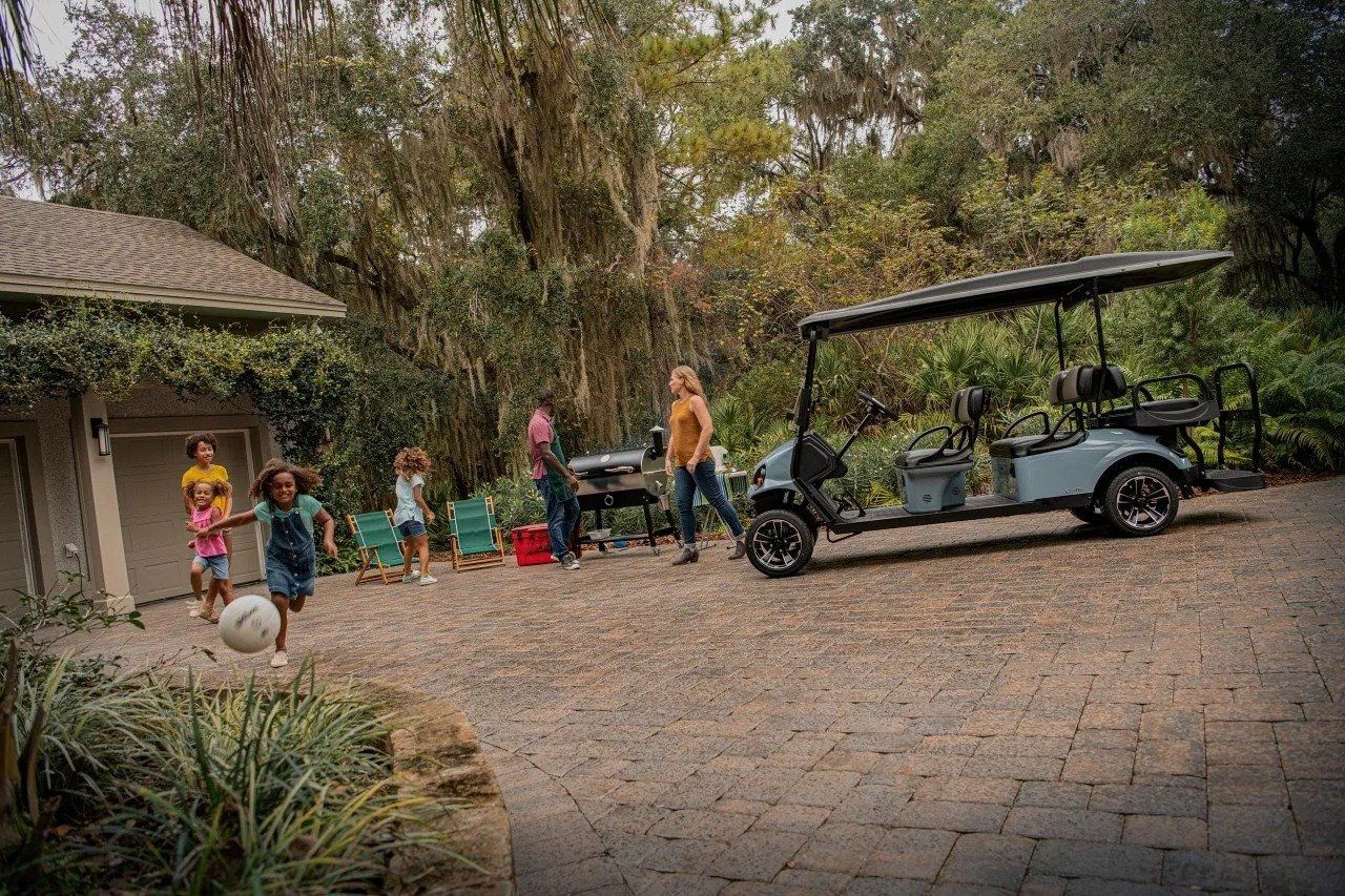 Family with golf car