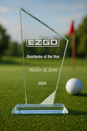 A glass trophy that says ezgo distributor of the year