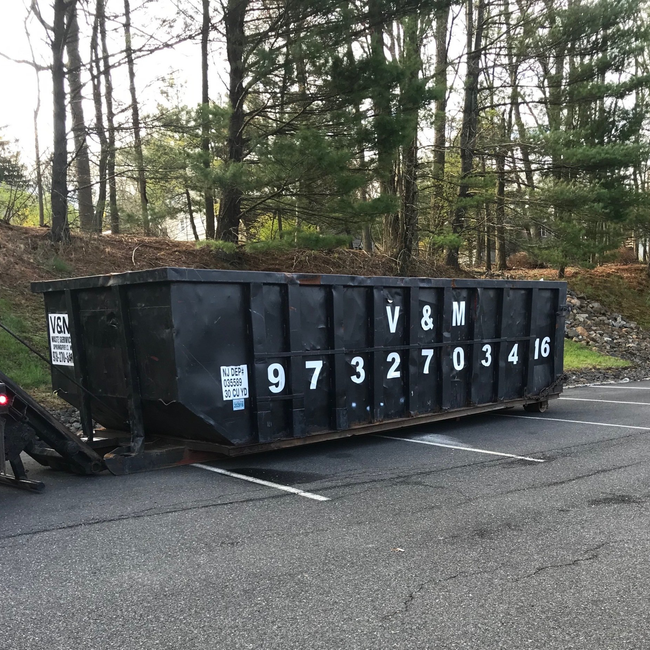 Black dumpster