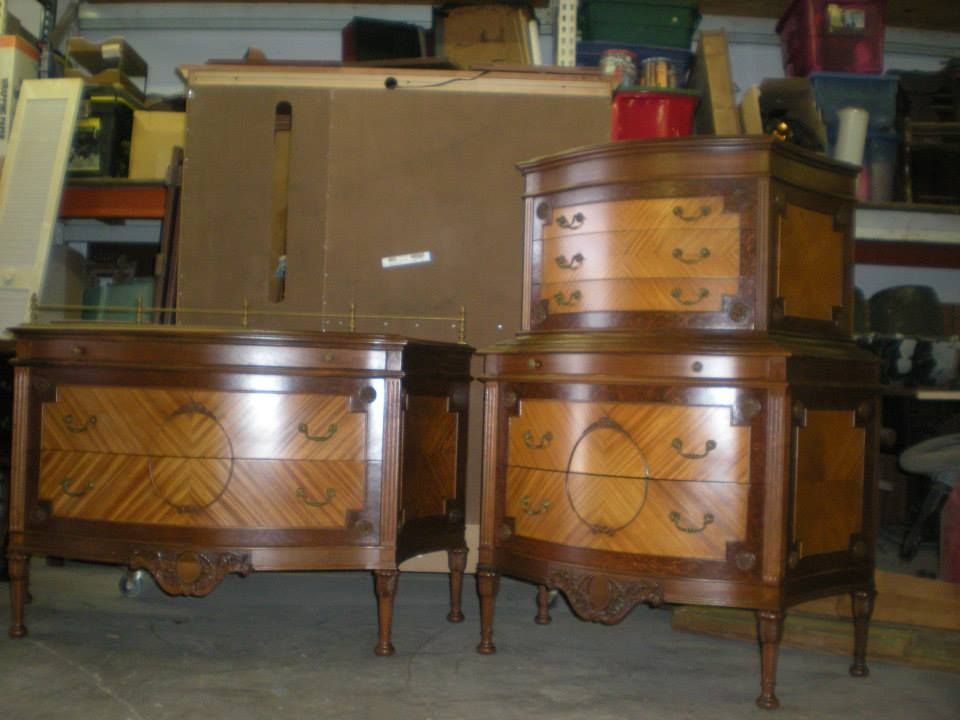 two dressers are sitting next to each other in a garage