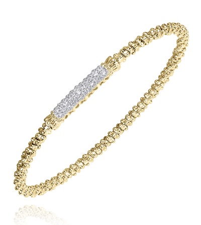 a yellow gold bracelet with diamonds on a white background