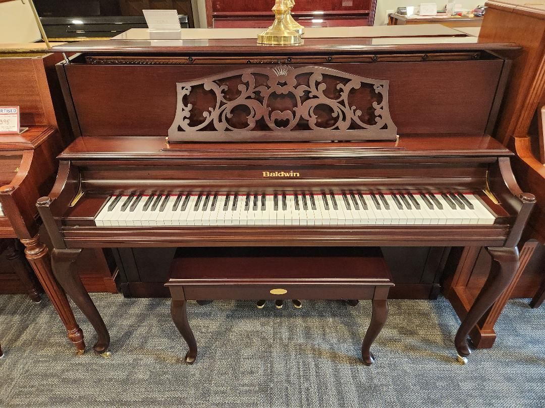 (Baldwin Queen Anne Deluxe Dark Mahogany Console Piano)
Stock #7999 
$2,895