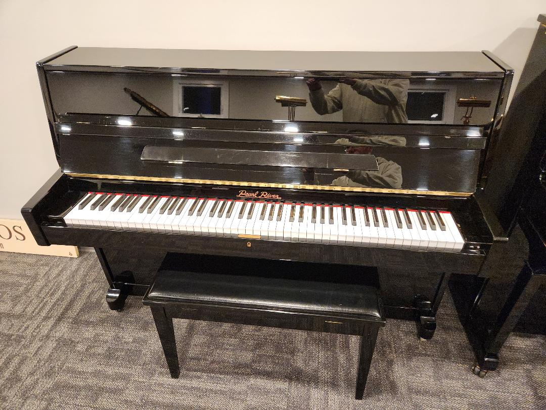 Pearl River High Gloss Ebony Euro Style Console Piano.
