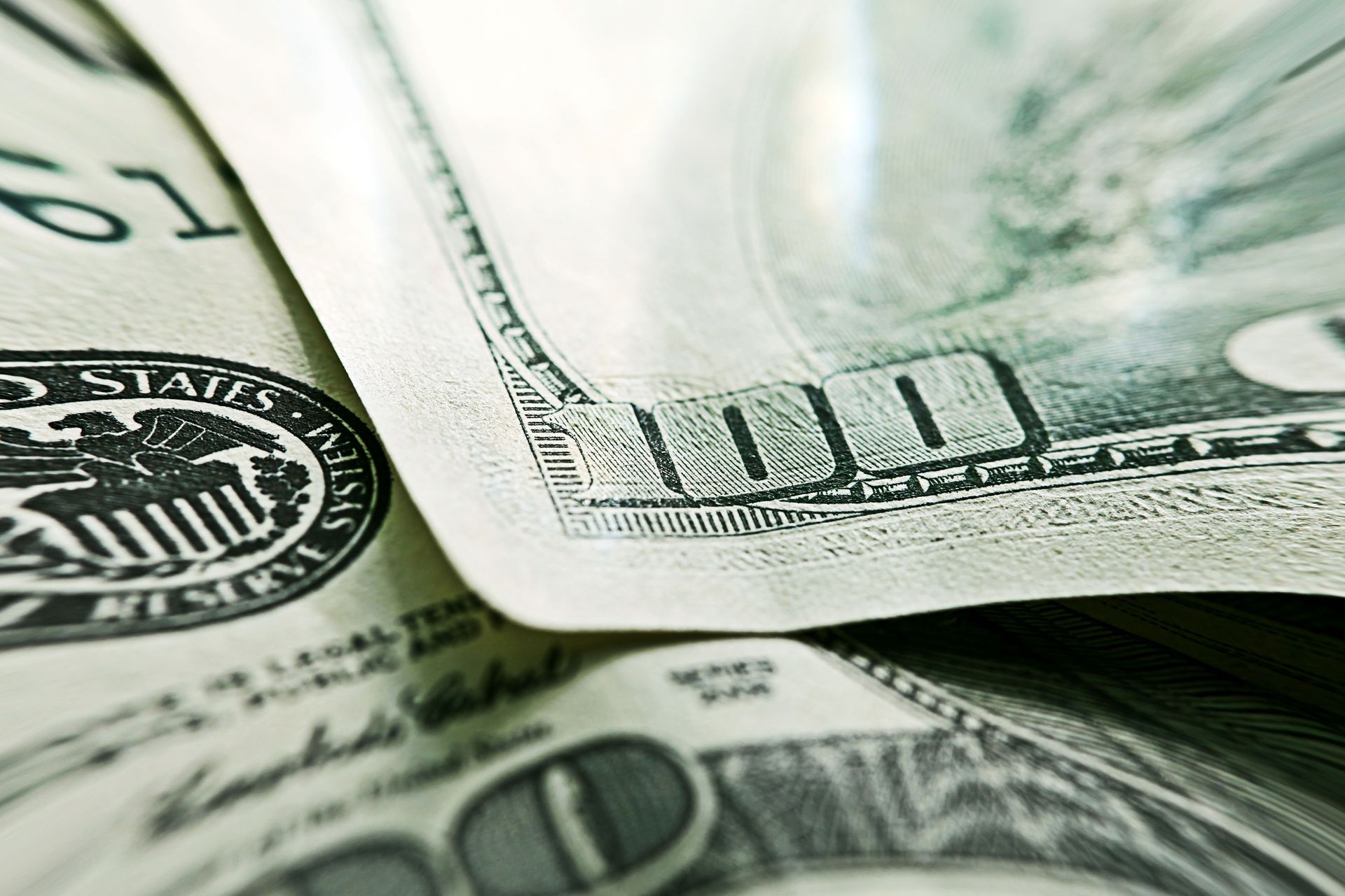 Magnified 100-dollar bills.